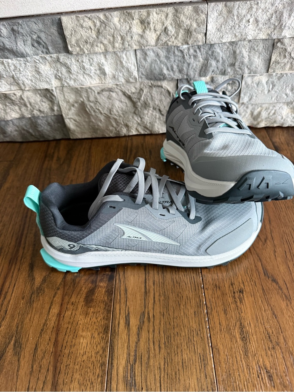 Altra Women's Light Gray Trail Running Sneakers with Teal Accents